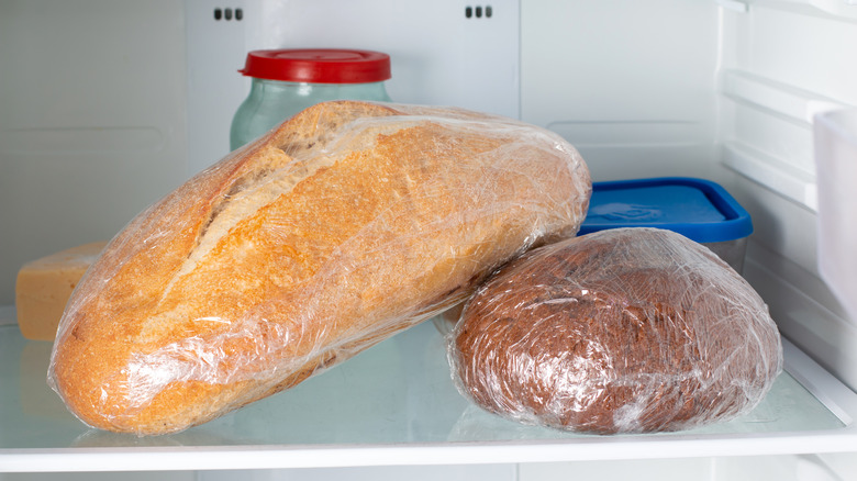 Bread in plastic wrap in freezer