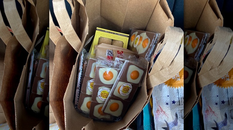 double bagged paper bag with four packages of Caramel Chocolate Yolkies from Trader Joe's