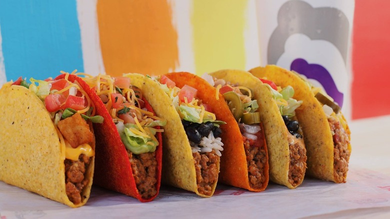 Taco Bell tacos lined up in a row