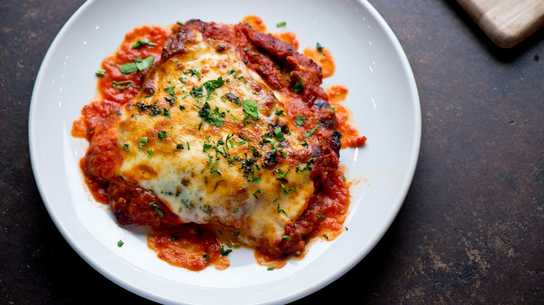 chicken parmesan on white plate