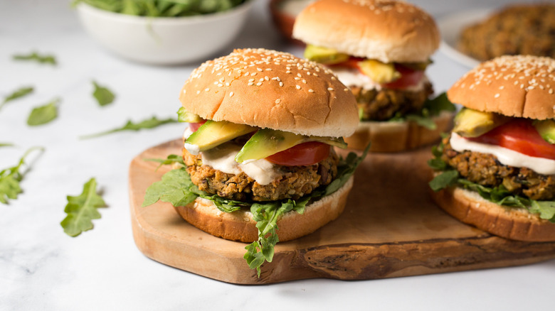 colorful veggie burgers on table