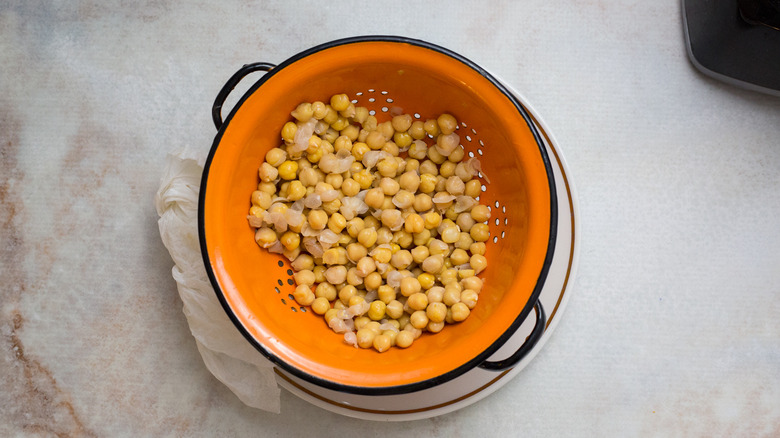 chickpeas in orange colander