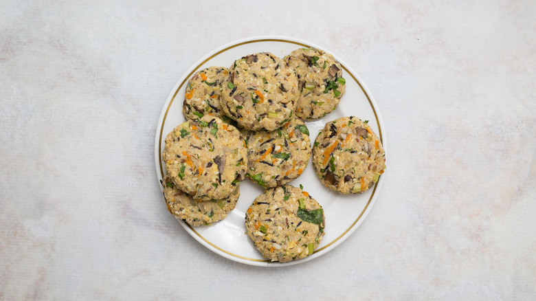 uncooked veggie burgers on plate