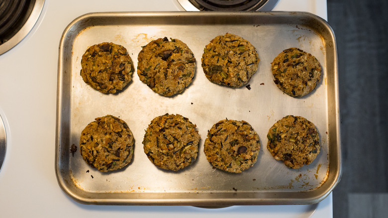 veggie burgers on baking sheet