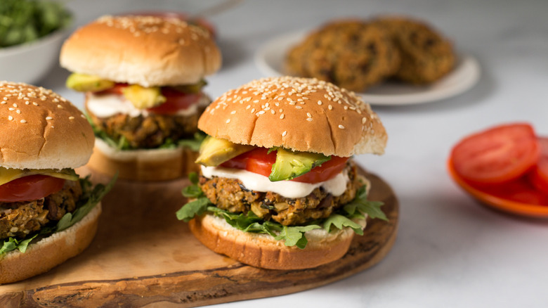 colorful veggie burgers on table