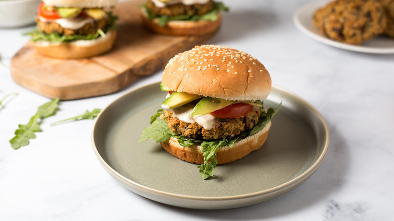 colorful veggie burgers on table