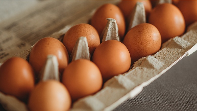 carton of brown eggs