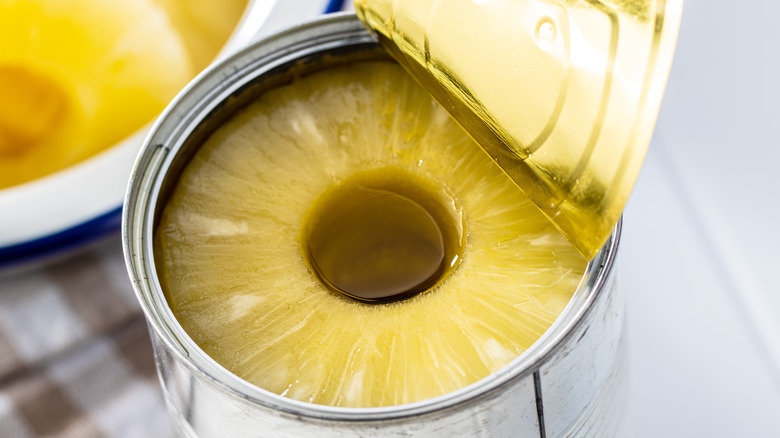 Pineapple rings in open can