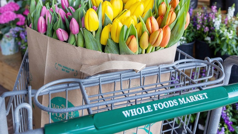 Whole Foods Market cart with flowers