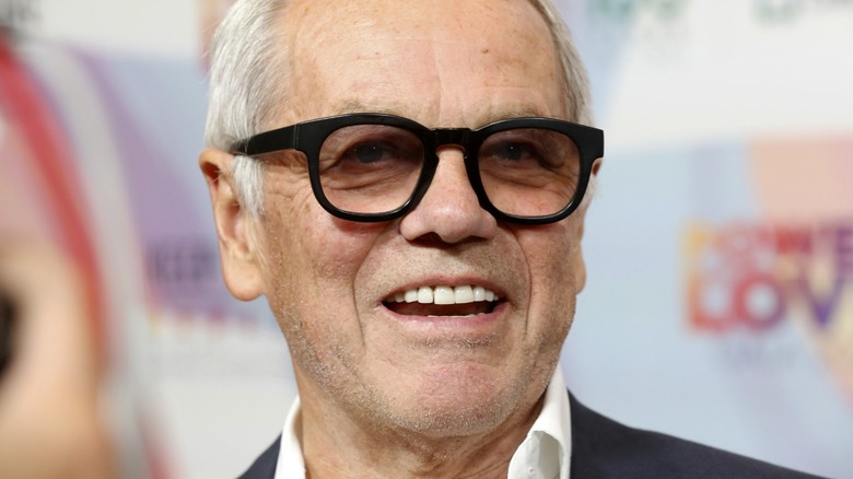 Wolfgang Puck wearing thick glasses