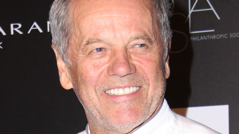 Wolfgang Puck smiling at event 