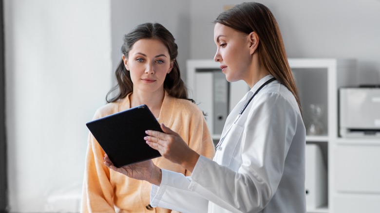 female doctor with female patient