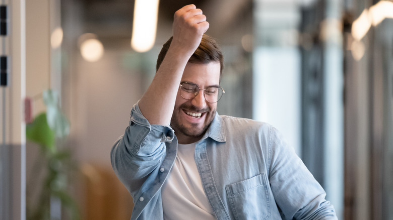 Happy man celebrating