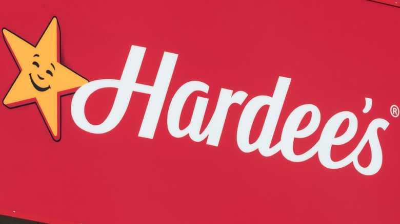 Hardee's logo on red sign
