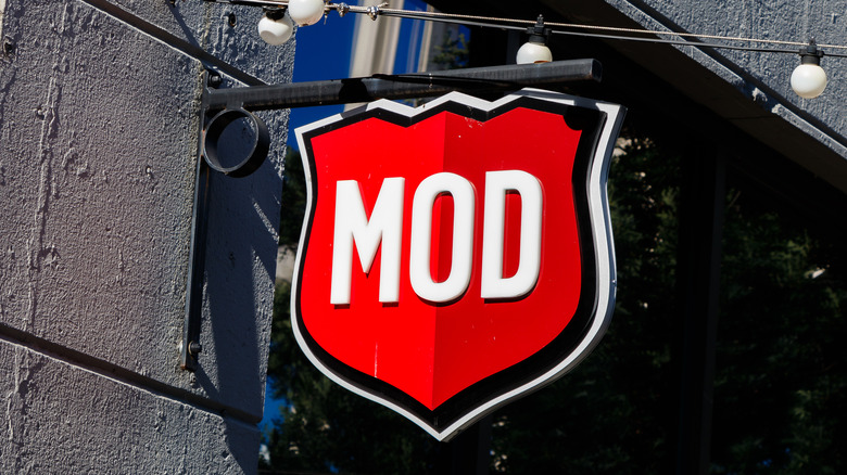 A MOD Pizza logo