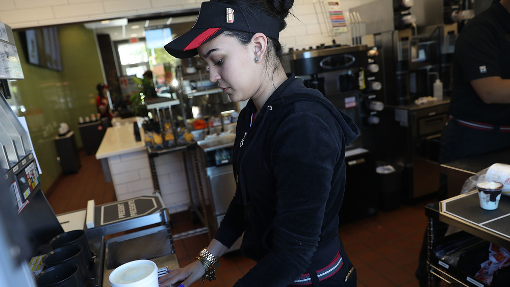 mcdonald's employee by drink machine