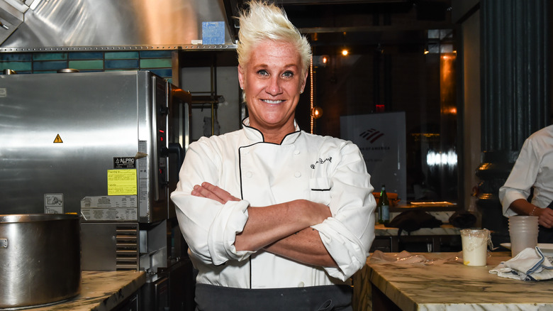 Anne Burrell, standing triumphant 