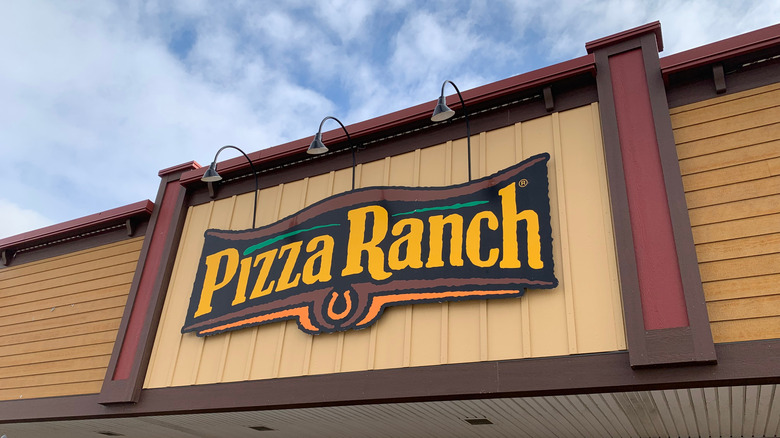 Pizza Ranch sign on building