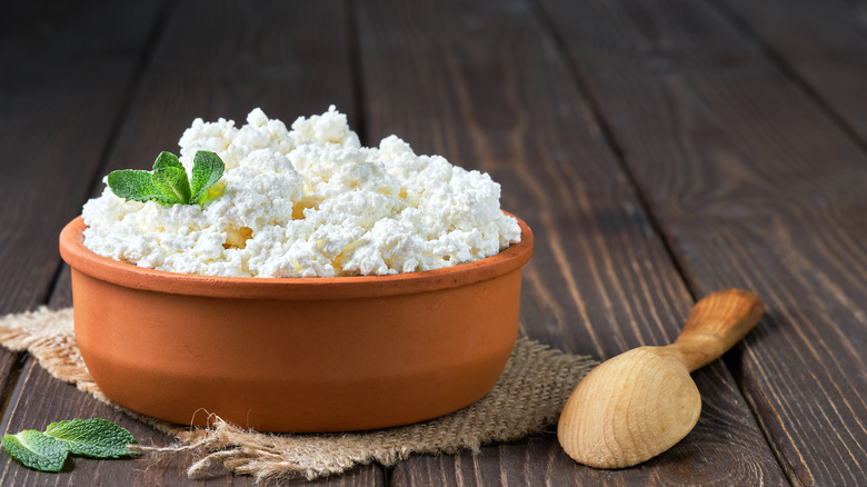 Cottage cheese on wood table