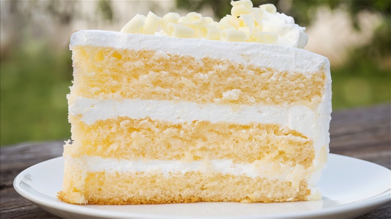 A slice of yellow cake on a plate
