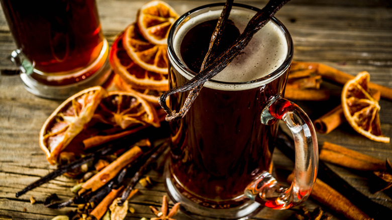 Mulled beer with cinnamon sticks