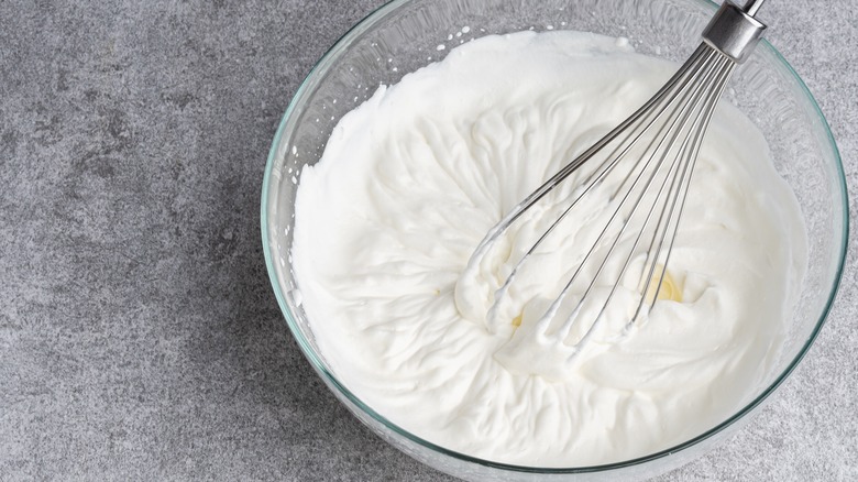 Heavy whipping cream in bowl