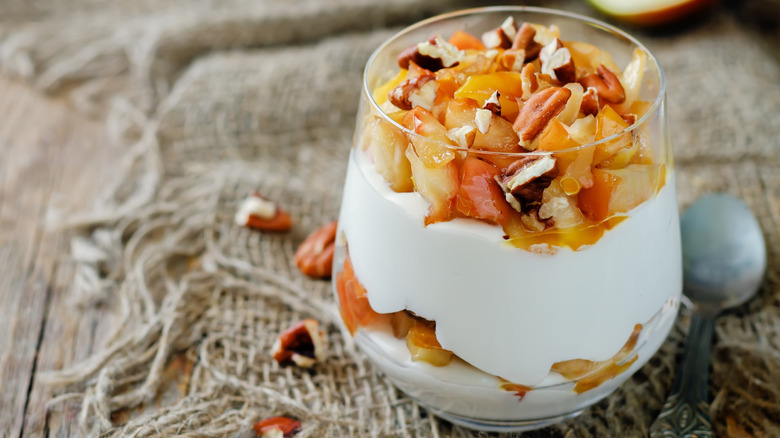 Caramelized apples in a glass of yogurt