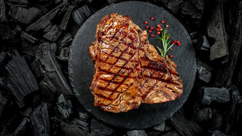 Steak on black plate