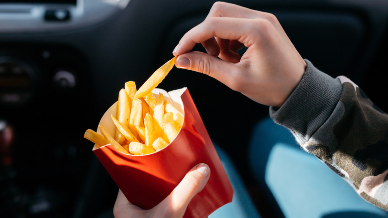 eating french fries in the car