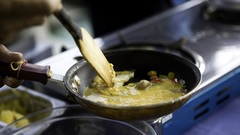 stirring omelette with a spatula