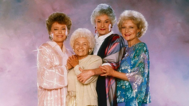 Blanche, Sophia, Dorothy, and Rose from the Golden Girls in formal attire