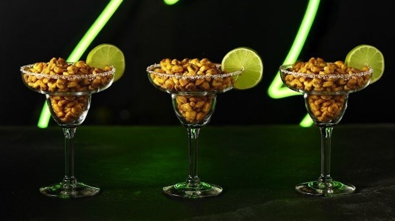 Mexican-style street corn Corn Nuts in margarita glasses