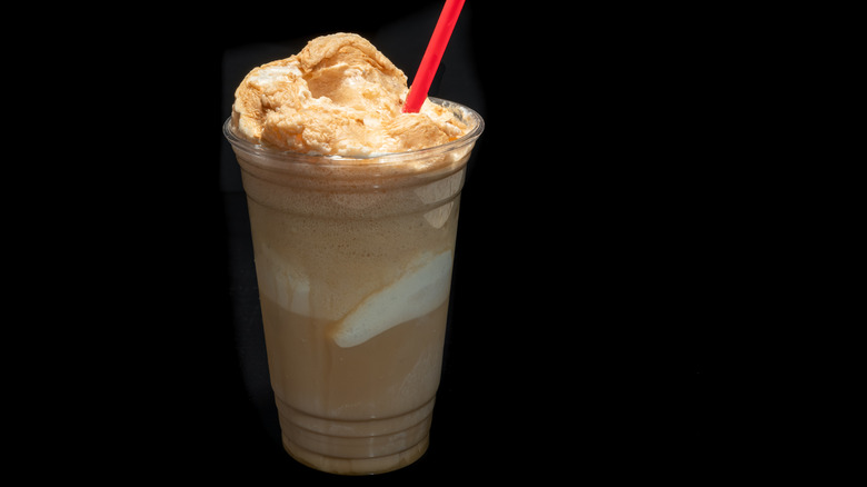 Coke float in a plastic cup