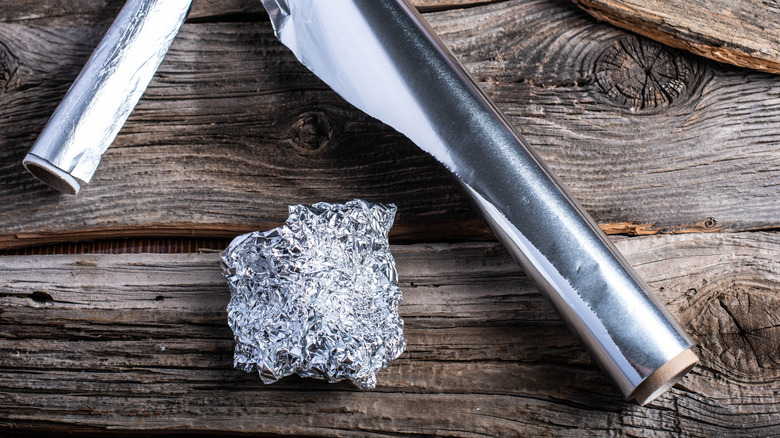 Aluminum foil on wooden table