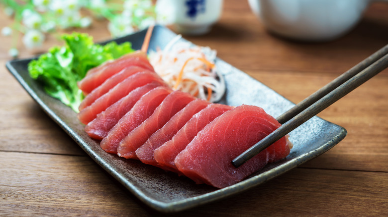 tuna sashimi on black plate
