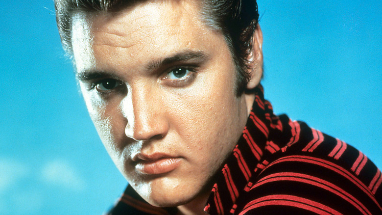 Elvis Presley wearing striped shirt