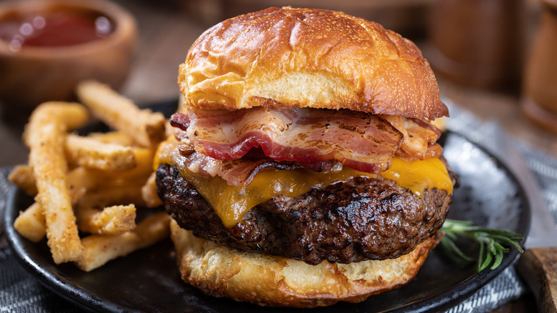 bacon cheeseburger with french fries