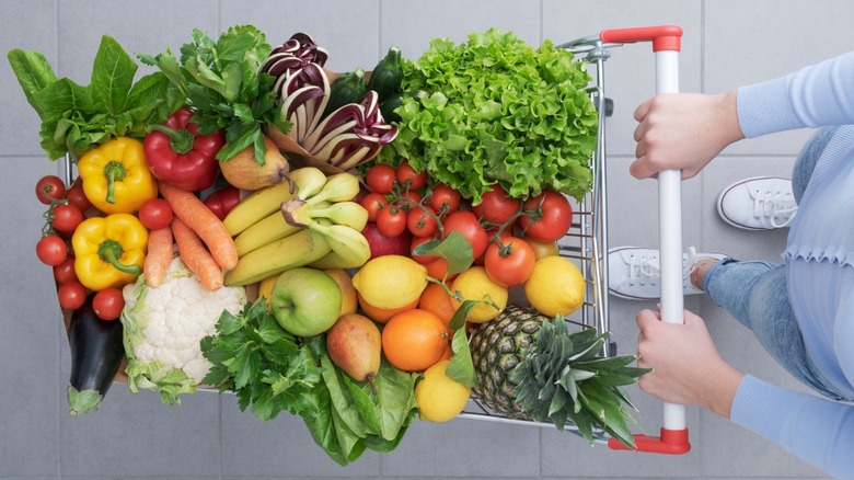 trolley full of fruits and vegetables