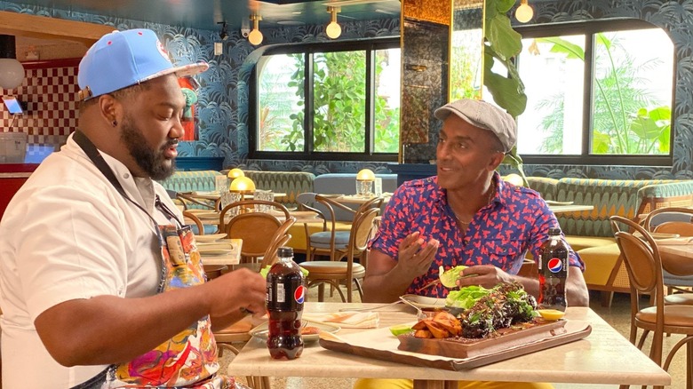 Marcus Samuelsson and Tristen Epps sitting