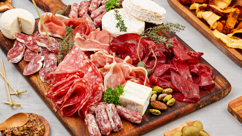 Charcuterie board with meat and cheese