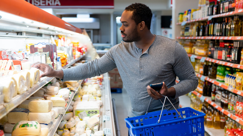 man grocery shopping