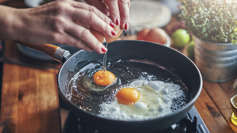Eggs frying in oil