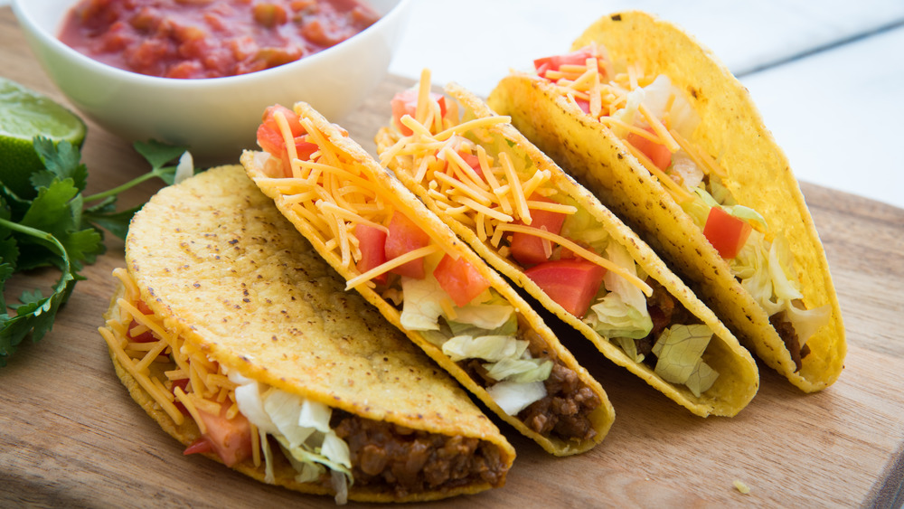 hard shell tacos with lettuce tomato and cheese
