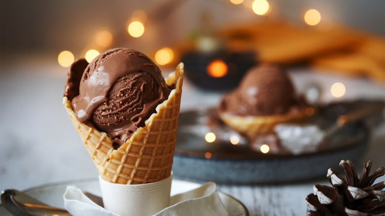 scoop of chocolate ice cream in cone