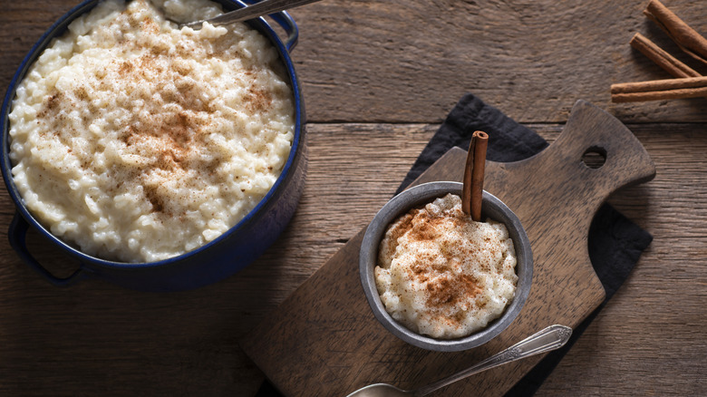 small bowl and serving dish of rice pudding