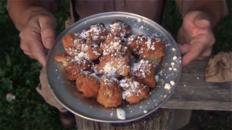 A plate of freshly-cooked cowboy donuts, also known as bear signs.