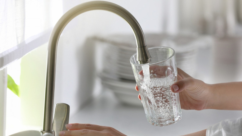 Tap water going into a glass