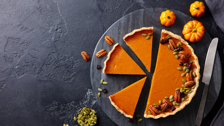 Pumpkin pie on marble slab