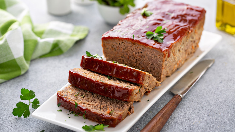 Sliced meatloaf with parsley garnish