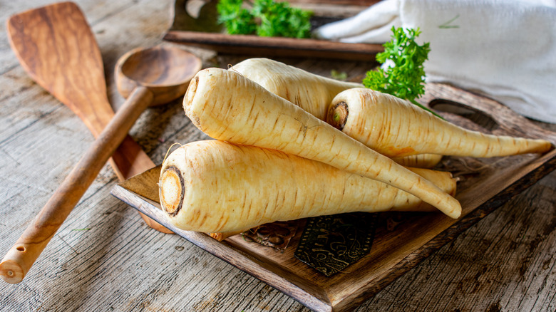 raw parsnips on table